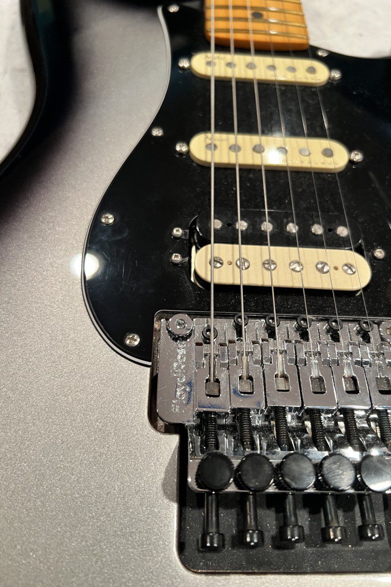 Electric guitar with tremolo and pickups.