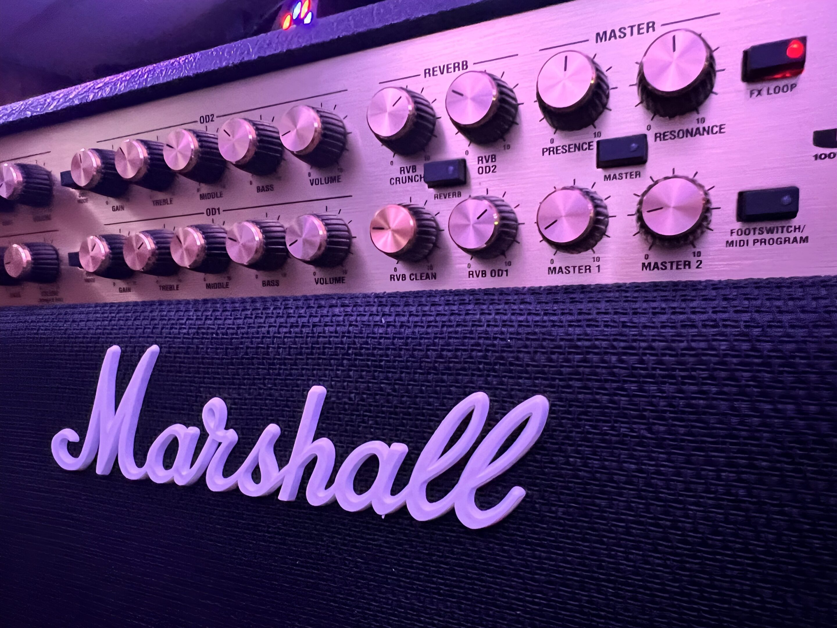 Marshall amplifier with various control knobs.