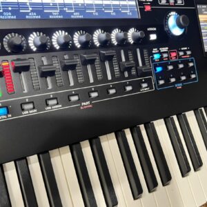 Electronic keyboard with control panel and screen.